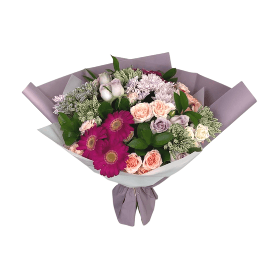 Pink Roses hues bouquet in a lilac wrapping